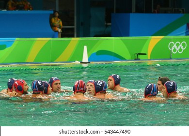 RIO DE JANEIRO, BRAZIL - AUGUST 10, 2016: Water Polo Team USA Before Rio 2016 Olympics Men's Preliminary Round Match Against Team France At The Maria Lenk Aquatic Center 