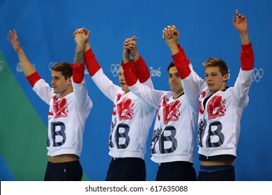 RIO DE JANEIRO, BRAZIL - AUGUST 13, 2016: Great Britain Men's 4x100m Medley Relay Team Chris Walker-Hebborn, Adam Peaty, James Guy, Duncan Scott During Medal Ceremony At The Rio 2016 Olympic Games 