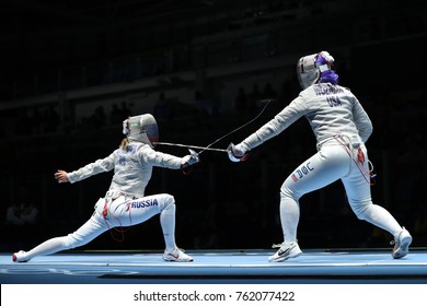 RIO DE JANEIRO, BRAZIL - AUGUST 13, 2016: Dagmara Wozniak Of United States (R) And Ekaterina Dyachenko Of Russia Compete In The Women's Sabre Team Of The Rio 2016 Olympic Games At Carioca Arena 3