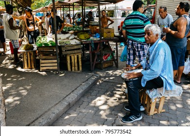 Rio De Janeiro, Brazil - Dec 15, 2017: Older Brazilian Man Playing Drums In A Street Market In Rio De Janeiro, Brazil