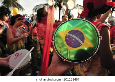 RIO DE JANEIRO, BRAZIL - FEBRUARY 08, 2013: Street Carnival In Rio De Janeiro, Crowd Of People Celebrate On The Street With Blocos, Individual Groups Who Plan The Parties With Bands And Samba Music.