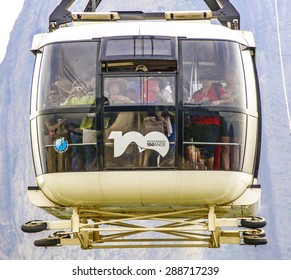 RIO DE JANEIRO-  BRAZIL - JAN 30, 2015: People In Overhead Cable Car Over Sugarloaf Mountain, Rio De Janeiro, Brazil.