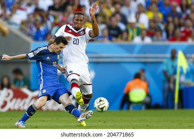 RIO DE JANEIRO, BRAZIL - July 13, 2014: Messi Of Argentina And Boateng Of Germany During The 2014 World Cup Final Game Between Argentina And Germany At Maracana Stadium. NO USE IN BRAZIL. 