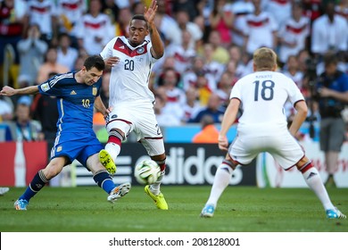 RIO DE JANEIRO, BRAZIL - July 13, 2014: Messi Of Argentina And Boateng Of Germany During The World Cup Final Game Between Argentina And Germany At Maracana Stadium. NO USE IN BRAZIL.