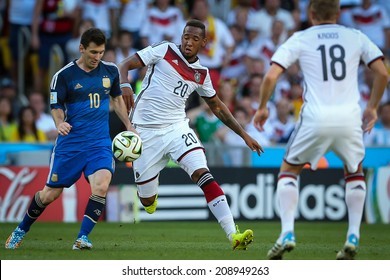 RIO DE JANEIRO, BRAZIL - July 13, 2014: Messi Of Argentina And Boateng Of Germany During The World Cup Final Game Between Argentina And Germany At Maracana Stadium. NO USE IN BRAZIL.