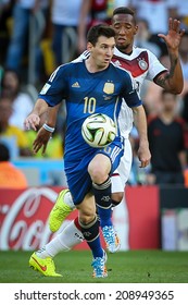 RIO DE JANEIRO, BRAZIL - July 13, 2014: Messi Of Argentina And Boateng Of Germany During The World Cup Final Game Between Argentina And Germany At Maracana Stadium. NO USE IN BRAZIL.