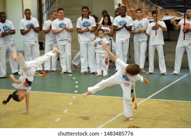 Rio de Janeiro, Brazil, June 24, 2019
Kids playing capoeira in a school block on the west side of Rio de Janeiro city.