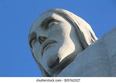 RIO DE JANEIRO, BRAZIL - JUNE 05, 2013: Close Up Of The Christ The Reedemer Statue In A Blue Sky.