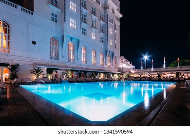 Rio De Janeiro, Brazil, March 17, 2019: Poolside Bar And Lounge Chairs At Luxurious Copacabana Palace Belmond In Copacabana, Rio De Janeiro, Brazil