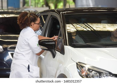 RIO DE JANEIRO, BRAZIL, MARCH, 23, 2020:flu Vaccination In Elderly People Using The Drive Thru System Receive The Vaccine Inside The Car To Prevent Crowding Due To The Coronavirus, Covid19