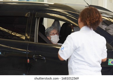 RIO DE JANEIRO, BRAZIL, MARCH, 23, 2020:flu Vaccination In Elderly People Using The Drive Thru System Receive The Vaccine Inside The Car To Prevent Crowding Due To The Coronavirus, Covid19