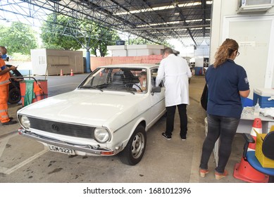 RIO DE JANEIRO, BRAZIL, MARCH, 23, 2020:flu Vaccination In Elderly People Using The Drive Thru System Receive The Vaccine Inside The Car To Prevent Crowding Due To The Coronavirus, Covid19