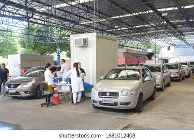 RIO DE JANEIRO, BRAZIL, MARCH, 23, 2020:flu Vaccination In Elderly People Using The Drive Thru System Receive The Vaccine Inside The Car To Prevent Crowding Due To The Coronavirus, Covid19