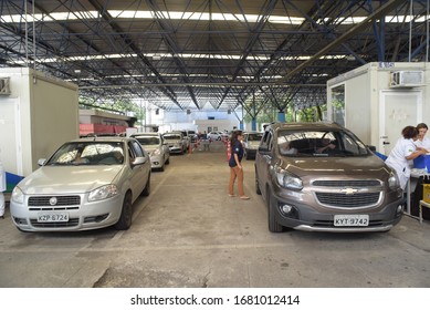 RIO DE JANEIRO, BRAZIL, MARCH, 23, 2020:flu Vaccination In Elderly People Using The Drive Thru System Receive The Vaccine Inside The Car To Prevent Crowding Due To The Coronavirus, Covid19