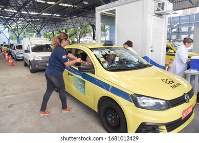 RIO DE JANEIRO, BRAZIL, MARCH, 23, 2020:flu Vaccination In Elderly People Using The Drive Thru System Receive The Vaccine Inside The Car To Prevent Crowding Due To The Coronavirus, Covid19