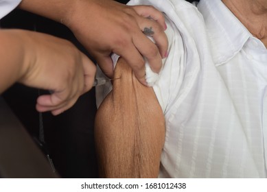 RIO DE JANEIRO, BRAZIL, MARCH, 23, 2020:flu Vaccination In Elderly People Using The Drive Thru System Receive The Vaccine Inside The Car To Prevent Crowding Due To The Coronavirus, Covid19