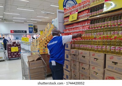 RIO DE JANEIRO, BRAZIL - MAY 29 2020: Employee Of Supermarket During The Covid-19 - Coronavirus,epidemic Outbreak. Stores Being Reopened And All Using Mask Face.