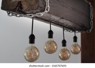 Rio De Janeiro, Brazil - Rustic Light Fixture Made With Rail Track Mandrel