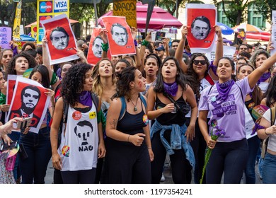 Rio de Janeiro, Brazil, September 29, 2018. Large protests of women in Brazil march at Cinelandia, against far-right presidential candidate Jair Bolsonaro, saying #NotHim.