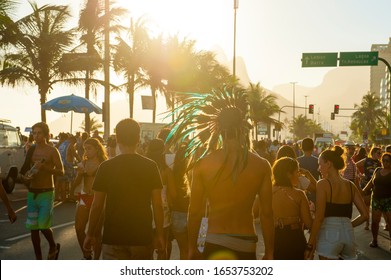 RIO DE JANEIRO - FEBRUARY 11, 2017: Crowds Of Brazilians Celebrate Carnival At A Sunset Bloco Street Party On The Ipanema Beachfront. 