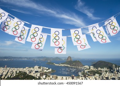 RIO DE JANEIRO - FEBRUARY 26, 2016: Olympic flag bunting hangs above the city skyline view of Sugarloaf Mountain and Guanabara Bay in celebration of the city hosting the Olympic Games.