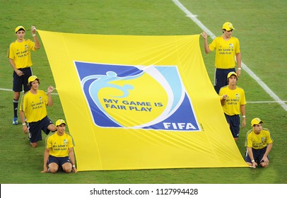 Rio De Janeiro, July 1, 2013.
Volunteers Hold The FIFA Fair Play Flag Before The Brazil Vs. Spain Match In The Final Of The 2013 Confederations Cup At The Maracanã Stadium In Rio