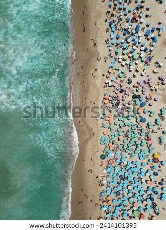 Similar – Luftaufnahme von fliegenden Drohnen der Menschenmenge, die sich am Strand in Rumänien am Schwarzen Meer entspannen.