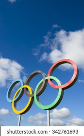 RIO DE JANEIRO - OCTOBER 14, 2015: A large display of the five interlocking Olympic rings stand in bright blue sky 