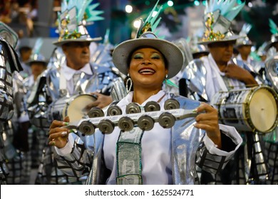 Rio de Janeiro, RJ / Brazil - March 05 2019 - Percussionist of samba school 'Mocidade de Padre Miguel', during carioca Carnival parade along the sambadrome.