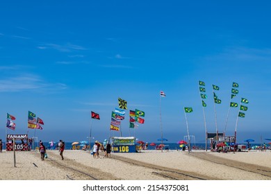 Rio De Janeiro RJ Brazil May 1st 2022 - View Of Copacabana Beach, With Its Tents And Food And Beverage Facilities, With Its Flags Fluttering In The Wind.