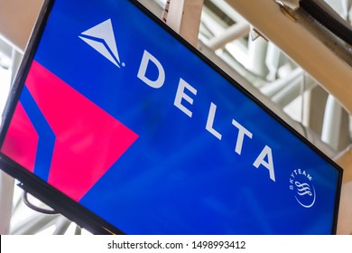 Rio de Janeiro/Brazil - August 26th 2019: Delta Airline Logo Shown in Television Screen at Check-In in Galeão International Airport (Aeroporto Internacional Antonio Carlos Jobim - Tom Jobim)