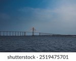 The Rio Negro bridge connecting the municipality of Manaus to the municipality of Iranduba and other locations in the northern region of Brazil on a clear, cloudless morning.