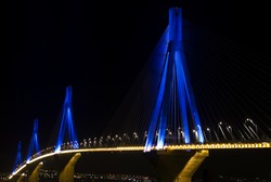 Rio-Antirio Bridge Over Sea, Illuminated At Night.