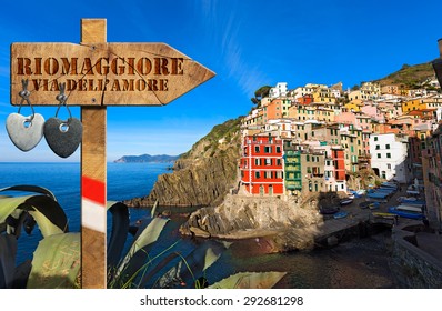 Riomaggiore / The way of love sign (via dell'amore) in Riomaggiore village, cinque terre national park in Liguria Italy. UNESCO world heritage site