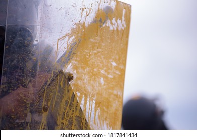 Riot Police Practice Crowd-control Scenarios From Protesters Throwing Officers With Paint.