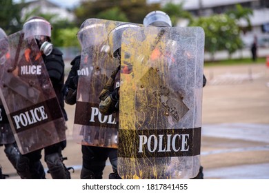 Riot Police Practice Crowd-control Scenarios From Protesters Throwing Officers With Paint.