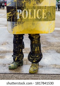 Riot Police Practice Crowd-control Scenarios From Protesters Throwing Officers With Paint.