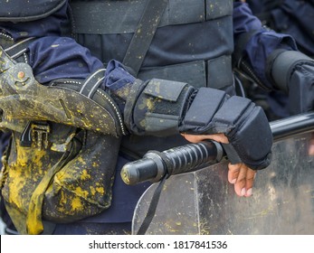 Riot Police Practice Crowd-control Scenarios From Protesters Throwing Officers With Paint.