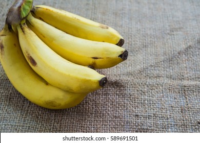 ripe banana place on hemp sack