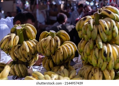 Ripe bananas at the city market. Arabic fruit and vegetable market. Tourist attractions in Egypt, city tour.