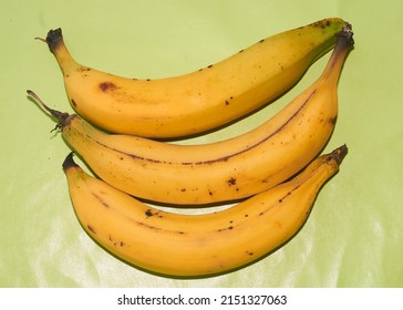 Ripe bananas, organic banana, natural, natural yellow with green background, "Plátano Macho Mexicano", Plátano Macho - Shutterstock ID 2151327063