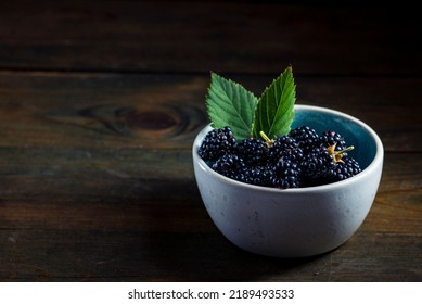 Ripe Blackberries With Leaves In A Clay Bowl On A  Wooden Background Dark Food Photography, Sweet Tasty Heap Antioxidant Organic Superfood