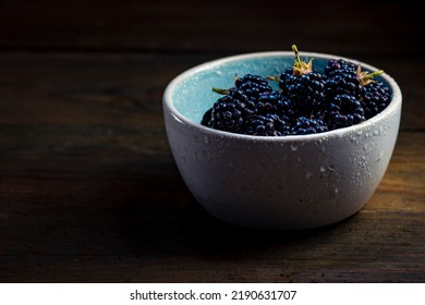 Ripe Blackberries With Leaves In A Clay Bowl On A  Wooden Background Dark Food Photography, Sweet Tasty Heap Antioxidant Organic Superfood