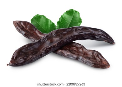 Ripe carob pods isolated on white background with full depth of field