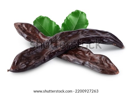 Ripe carob pods isolated on white background with full depth of field