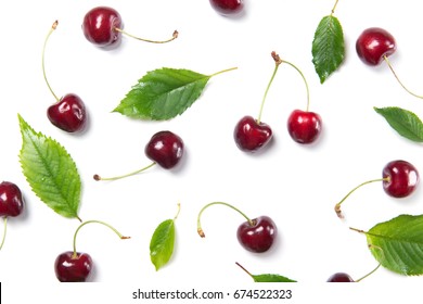 Ripe Cherry Berries And Cherry Leaves Pattern Isolated On White Background, Top View