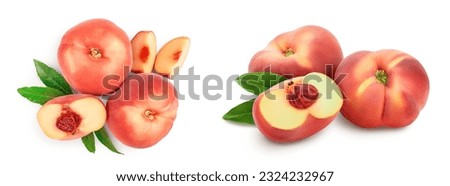 Ripe chinese flat peach fruit and half with leaf isolated on white background. Top view. Flat lay Foto d'archivio © 