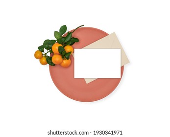 Ripe Clementines With Copy Space On Orange Plate Isolated On White. Citrus Clementina, Hybrid Of Tangerine. Healthy Living Mockup. Overhead View.