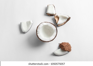 Ripe coconut on white background, top view