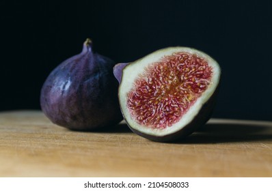 Ripe Figs On A Wooden Kitchen Table. Fresh Edible Fig Fruits Of Ficus Carica.